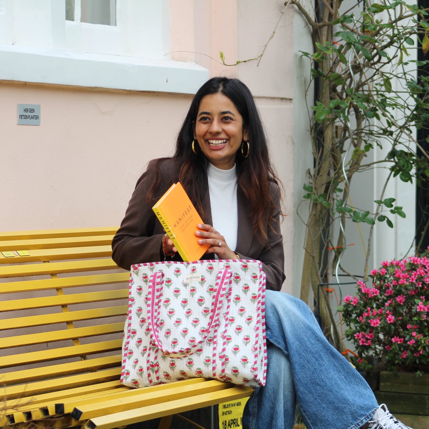tote bag with book on bench