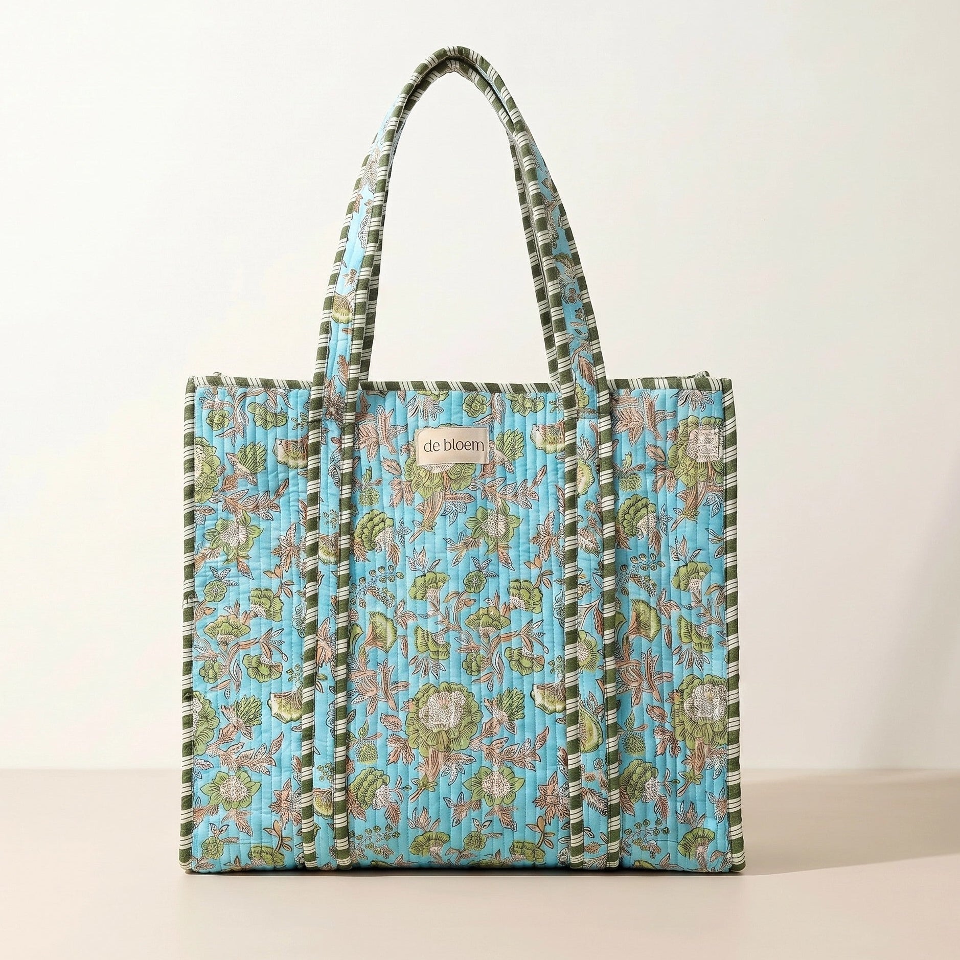 Floral patterned tote bag on a light background